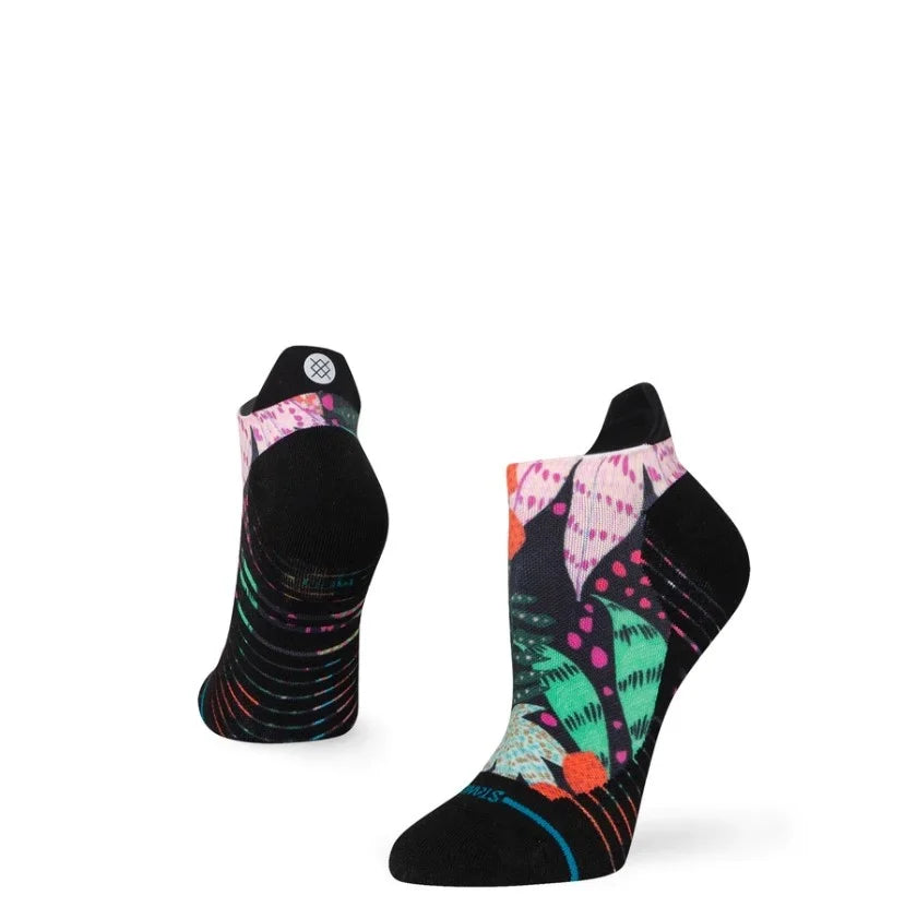 Stance Women's Trippy Trop Tab Sock 2024 - A pair of ankle-high socks with a tropical pattern in shades of pink, green, and orange on a white background.