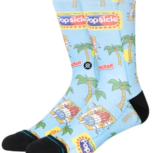 POPS CREW C SOCK 2024 - A pair of light blue crew socks with a repeating pattern of palm trees and popsicles.