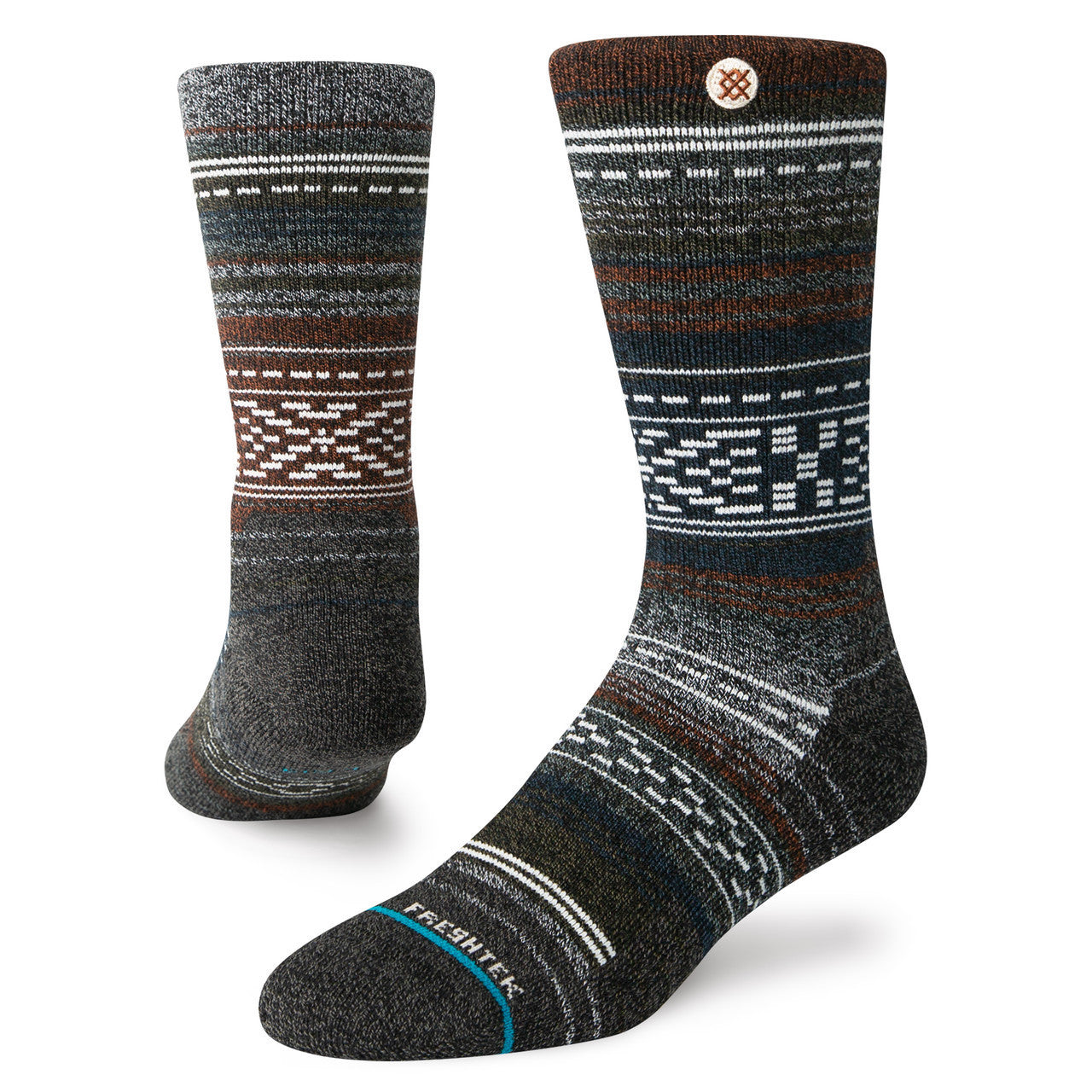 Windy Peaks Perf Crew 2024 - A pair of dark gray crew socks with a subtle pattern of lighter gray and brown lines, featuring white accents at the top and bottom.