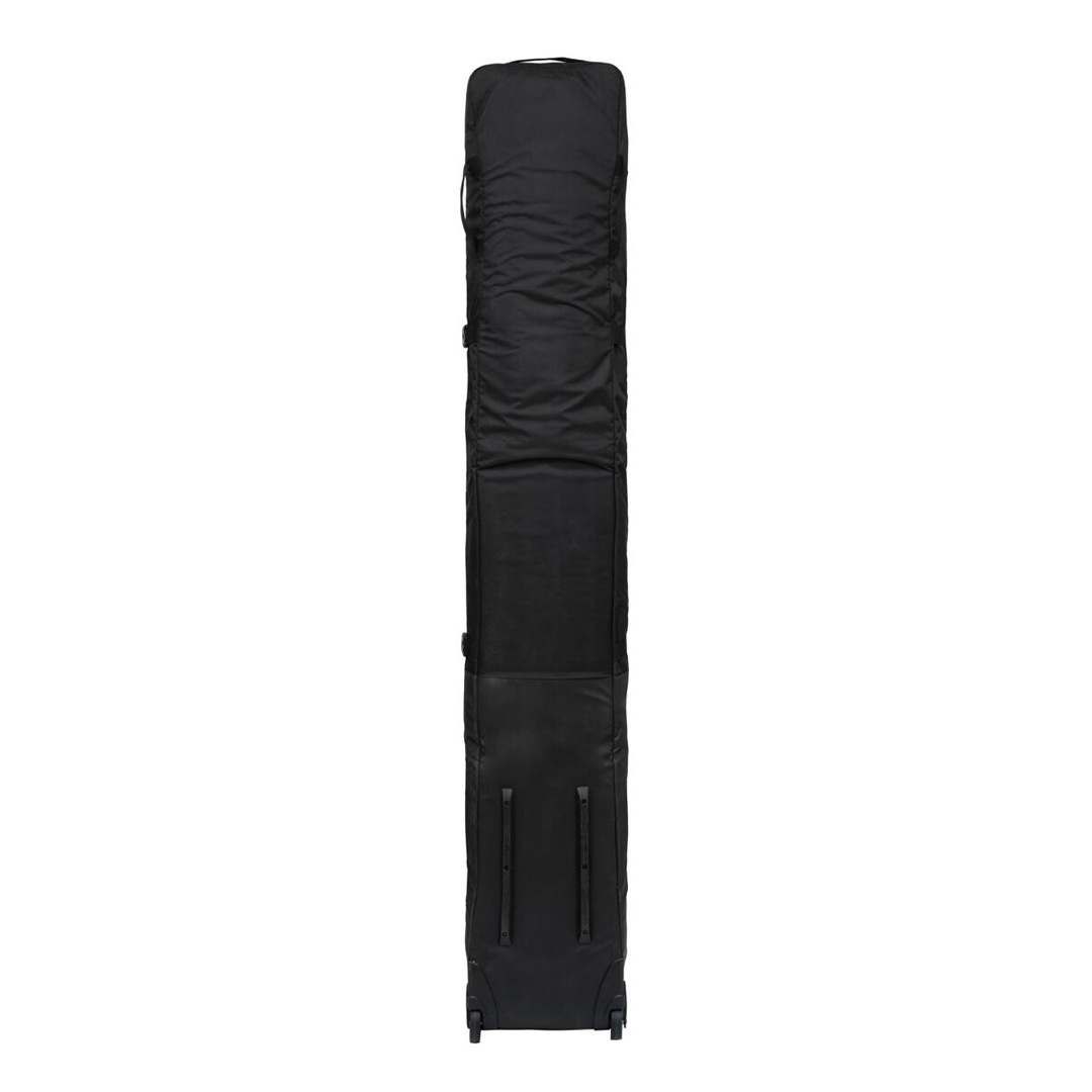 Armada Stibbs 4 Pair Ski Roller Bag - Black roller bag with four pairs of skis and a handle on top.