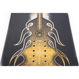 Nitro Stiletto RS x Drew Hicken Snowboard 2026 - A black snowboard with a yellow graphic of a woman's face and hair on top, and a yellow graphic of a man's face and mustache at the bottom.