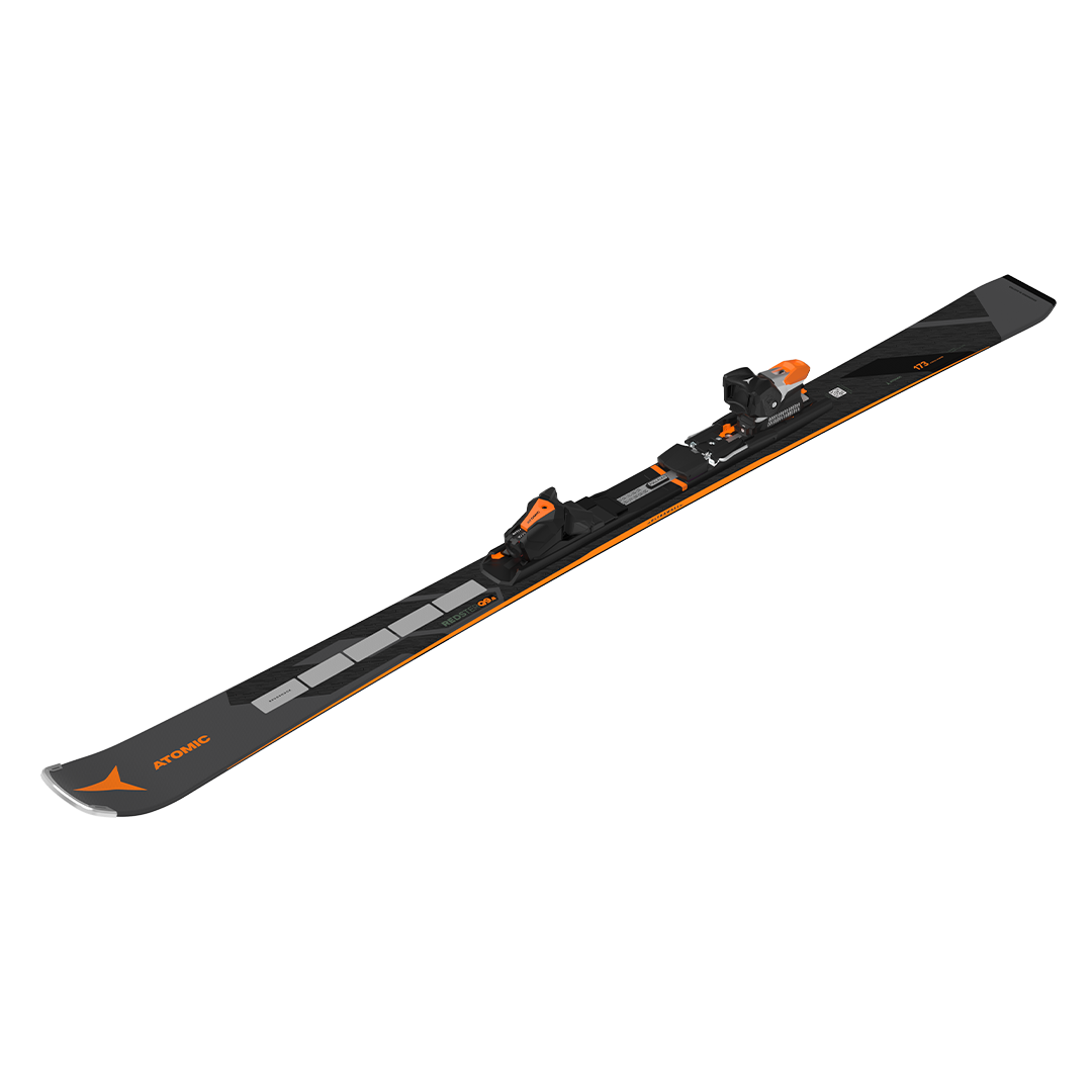 Atomic Redster Q9.8 Revoshock S with I12 Bindings - A black ski with orange accents and a distinctive "Revoshock" logo on the tip, featuring silver bindings.