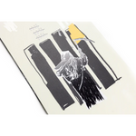 Nitro T1 Snowboard 2026 - A black snowboard with a white logo on top of it.