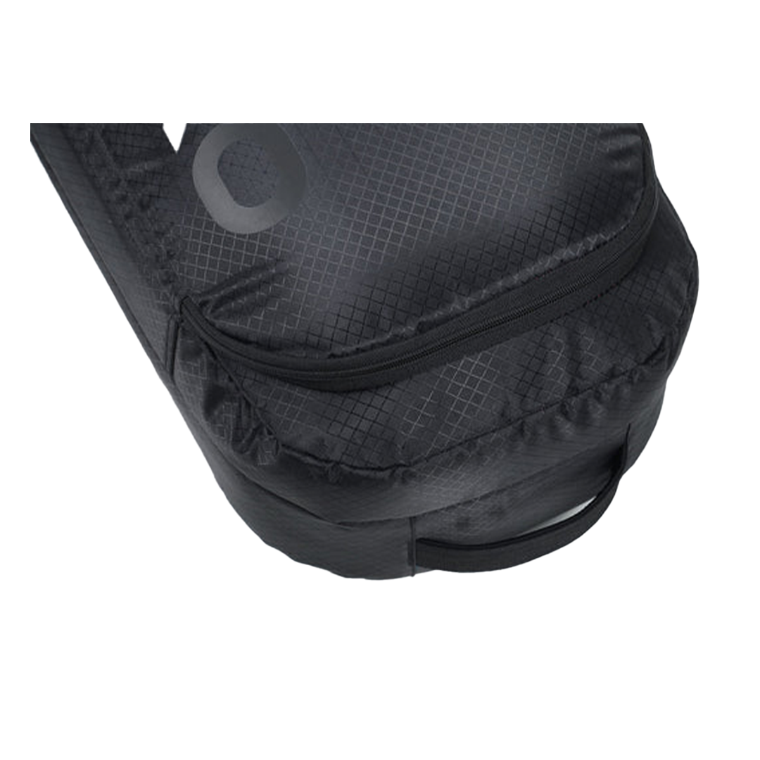 Nitro Tracker Wheelie Snowboard Bag - A black snowboard bag with a zippered pocket on its front side.
