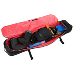 Nitro Tracker Wheelie Snowboard Bag - Black snowboard bag with orange accents and wheels on bottom.