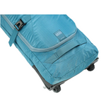 Nitro Tracker Wheelie Snowboard Bag - A large, light blue snowboard bag with a zippered top and two wheels on one end.