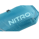 Nitro Tracker Wheelie Snowboard Bag - A light blue snowboard bag with a grid pattern and zipper on top, featuring the word "NITRO" in large letters across its side.