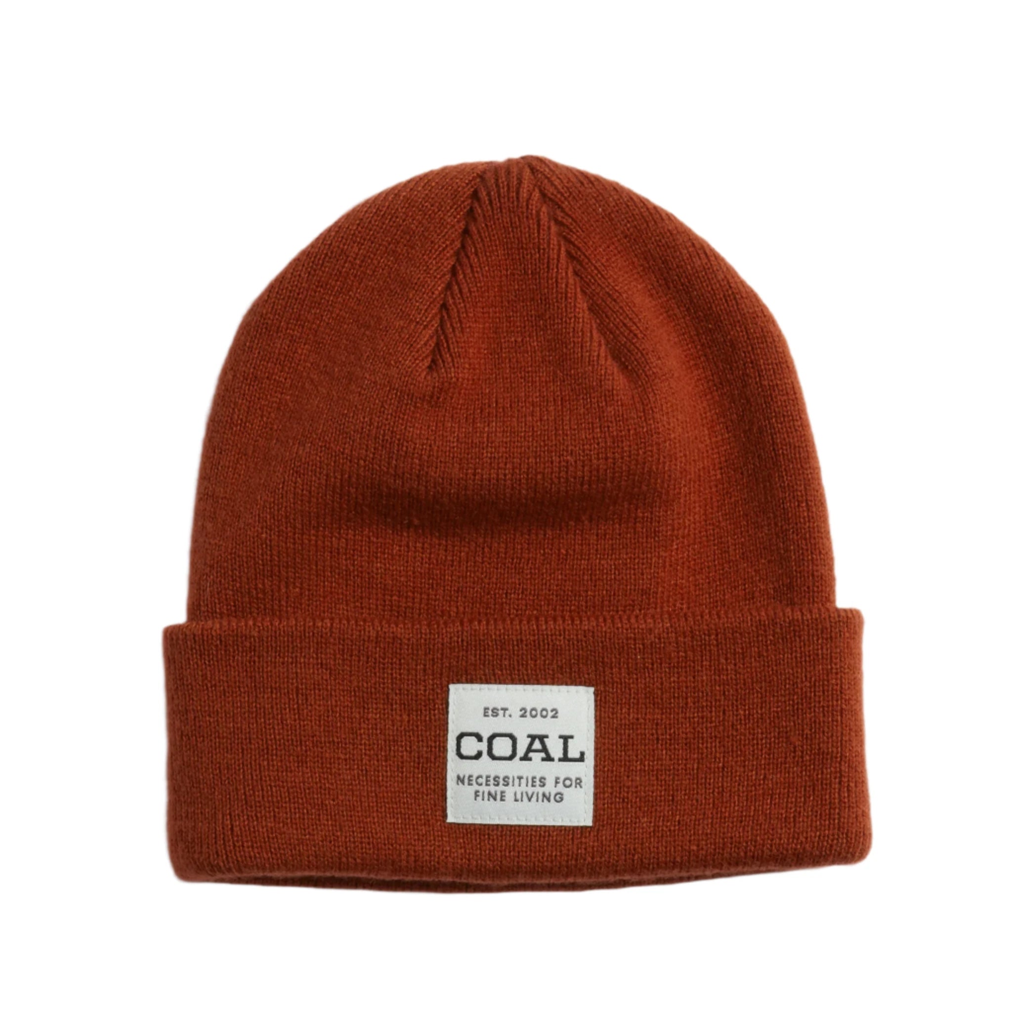 Coal Uniform Mid Knit Beanie 2025 - A rust-colored beanie with a white rectangular patch on the front featuring the word "COAL" in black font.