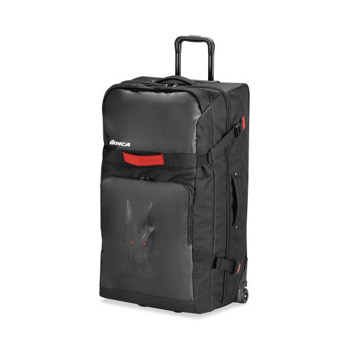 Nordica XL Doberman Roller Duffle Bag 2025 - A black roller duffle bag with a red handle and wheels, featuring a large zippered pocket on the front.