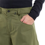 Volcom 5 Pocket Shell Pants 2024 - Olive green pants with two front pockets and one back pocket, featuring a zip fly closure.