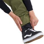 Volcom 5 Pocket Shell Pants 2024 - Olive green pants with black drawstring and zippered pockets.