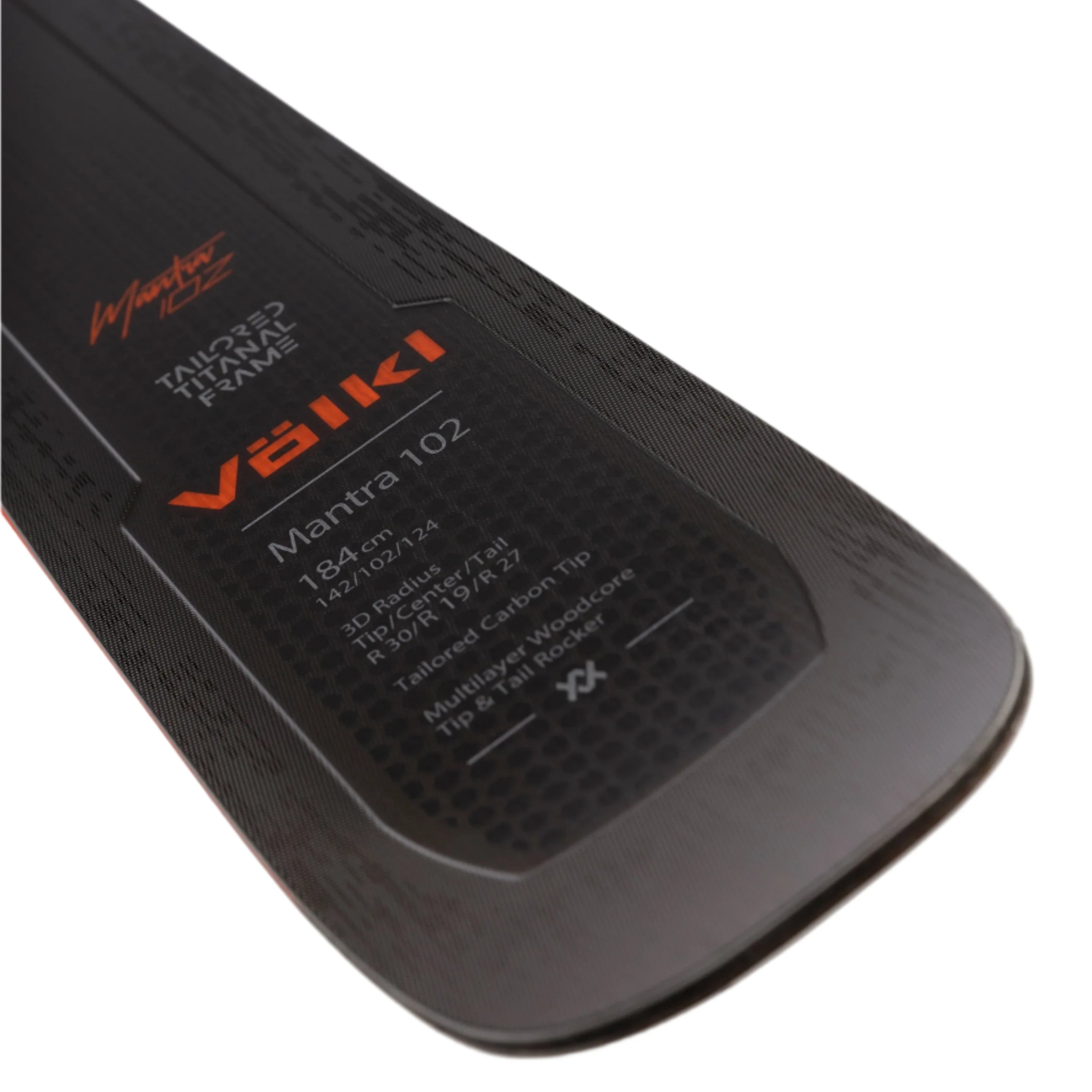 Völkl Mantra 102 Flat Skis 2025 - Black skis with orange lettering and a white logo on top.