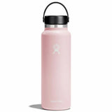 Hydro Flask 40oz Wide Mouth Water Bottle - A light pink water bottle with a black lid and handle, featuring a white logo on the front.