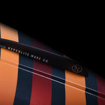 Hyperlite Baseline Wakeboard 2024 - A black wakeboard with white lettering and a logo on the top deck.