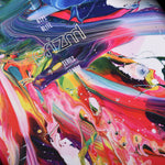 Hyperlite Women's Prizm Wakeboard 2024 - A women's wakeboard with a vibrant prismatic design featuring a mix of blue, green, and pink hues.