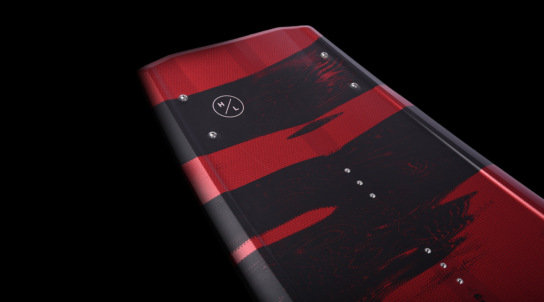 Hyperlite Riot Wakeboard 2024 - A red wakeboard with a black graphic of a man riding it on the top deck.