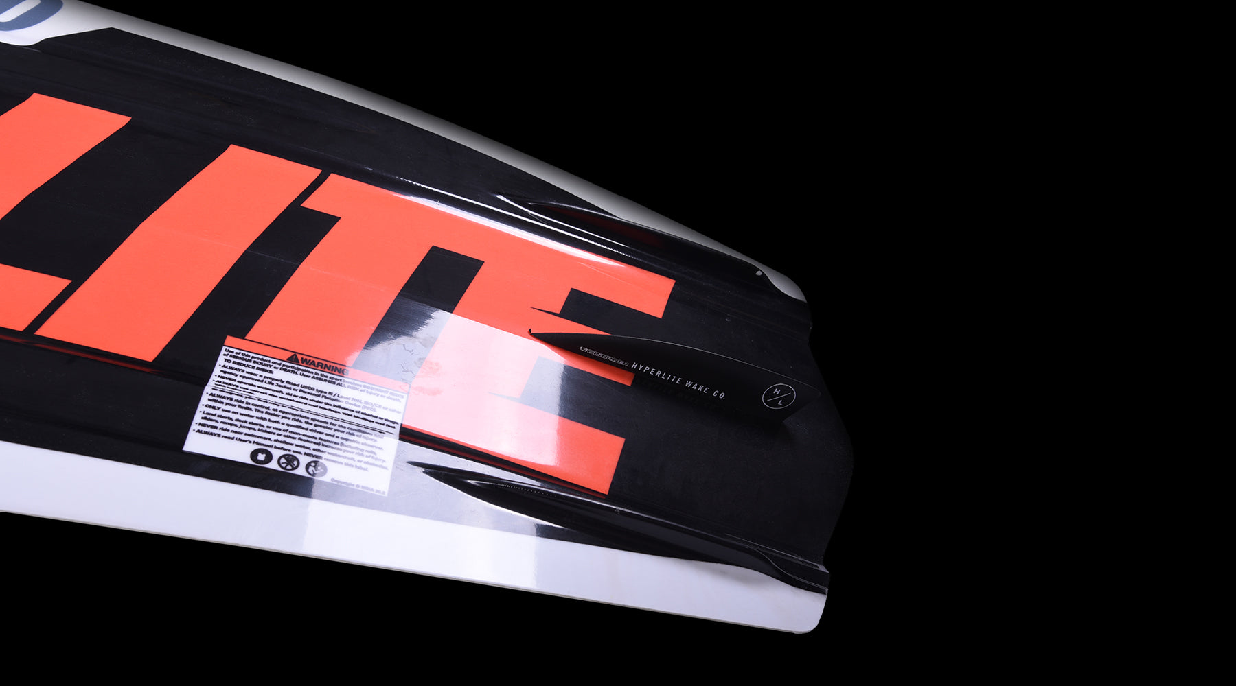 Hyperlite Junior's State 2.0 Package 2024 - A black and white waterski with a blue logo on the top left corner of the ski.