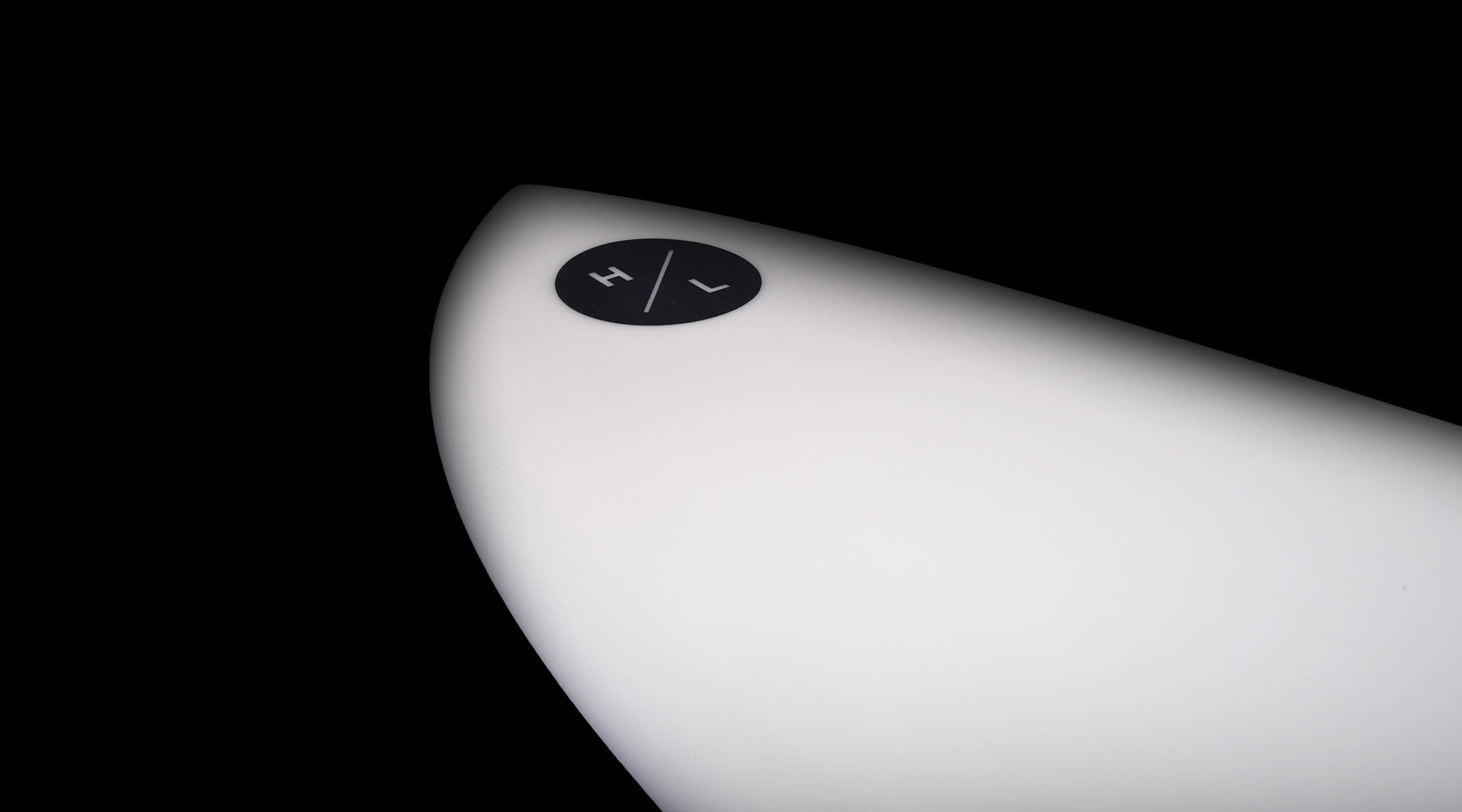 Hyperlite Condor Wakesurf Board 2024 - A white wakesurf board with a black logo on its top left corner.