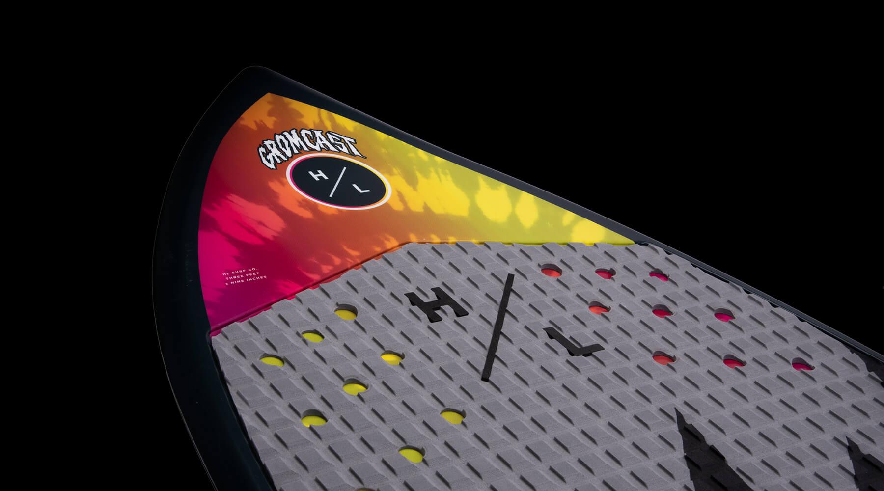 Hyperlite - Junior's Gromcast Wakesurf 2024 is shown in a grey color with a pattern of small, dark gray lines and circles on its surface.