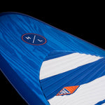 Hyperlite Landlock Wakesurf Board 2024 - A blue and white wakesurf board with a wood grain pattern on its deck.