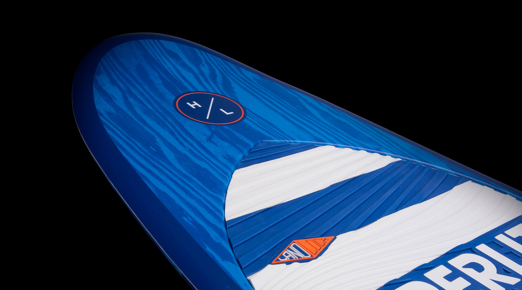 Hyperlite Landlock Wakesurf Board 2024 - A blue and white wakesurf board with a wood grain pattern on its deck.
