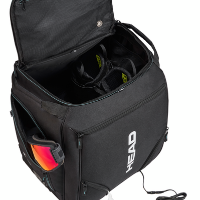 Head Heated Boot Bag - Black boot bag with a zippered top and two side pockets, featuring a white "HEAD" logo on one side.