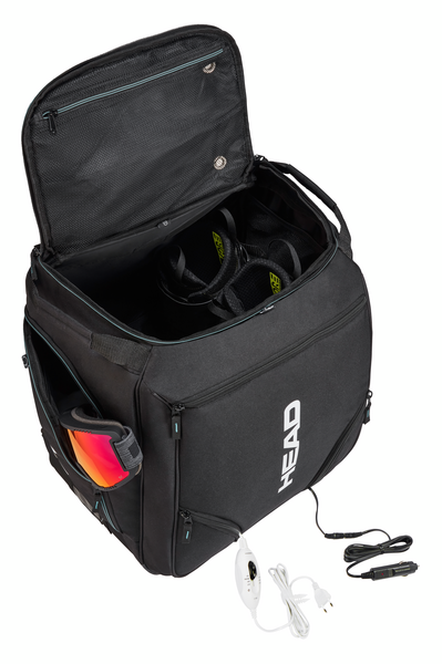 Head Heated Boot Bag - Black boot bag with a zippered top and two side pockets, featuring a white "HEAD" logo on one side.