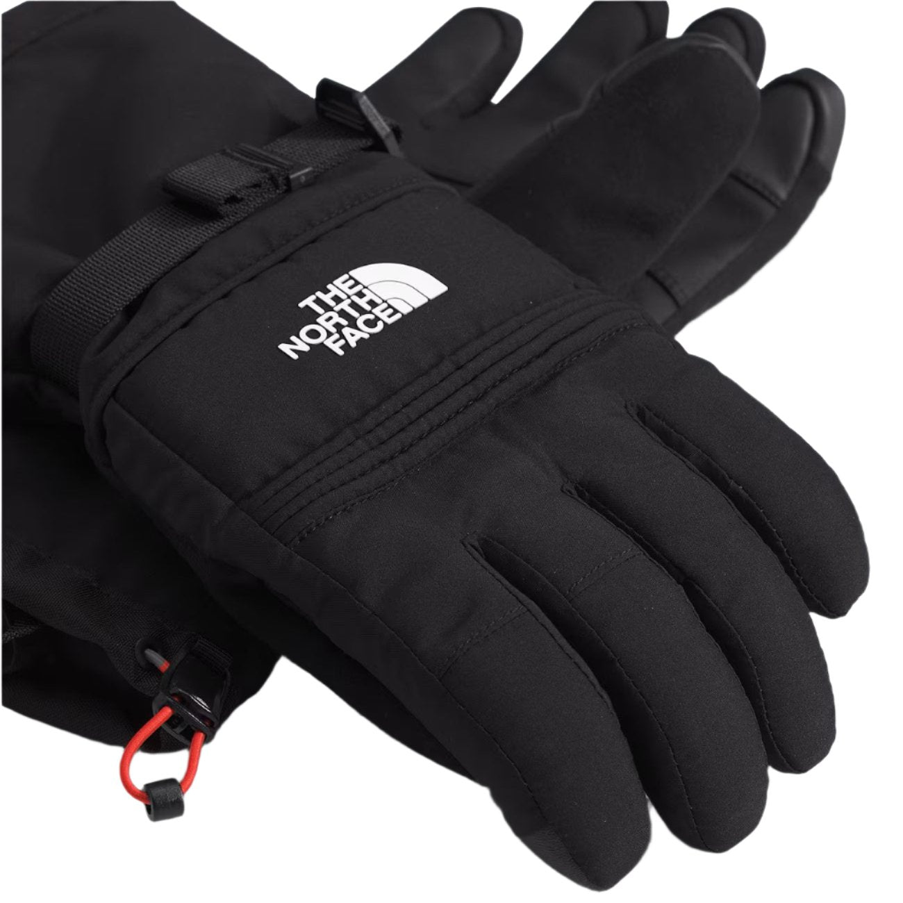 North Face Women's Montana Glove - A black glove with a white logo on the wrist, featuring a strap closure and a red pull tab.
