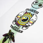 Jones Women's Tweaker Snowboard - A white snowboard with a pink and yellow graphic of a woman in a bikini riding a wave on its top side.