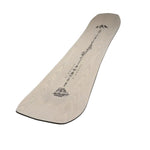 Jones Women's Flagship Snowboard 2025 - A light-colored snowboard with a black logo at the top and a black graphic on the bottom.