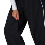 Black shell pants with side pocket and relaxed straight legs