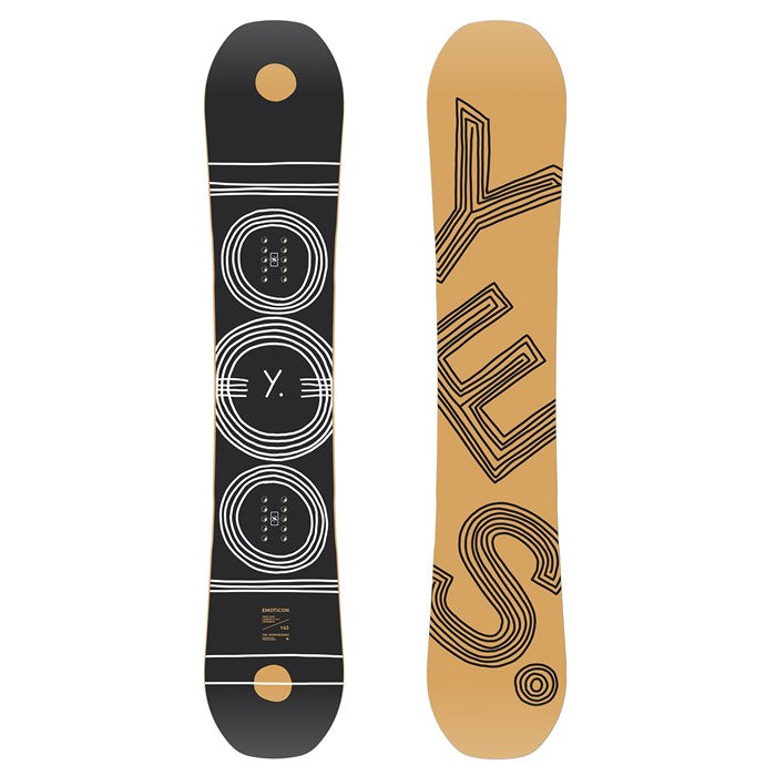 The Yes brand Women's Emoticon snowboard in black and tan features three white concentric circles with the letters "Y" and "E" inside.