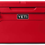 Yeti Tundra 65 Cooler - A large, red cooler with a handle on top and two latches on either side of it.