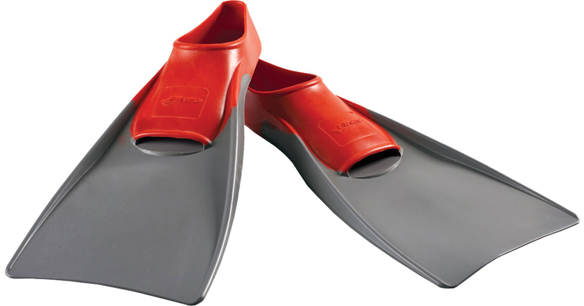 Finis Long Floating Swim Fins - These long, bright orange fins have a textured surface and are designed for swimming in the water.