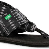 Sanuk Ladies' Yoga Sling 2 Prints Sandal - A black and white houndstooth patterned sandal with a green logo on the strap.