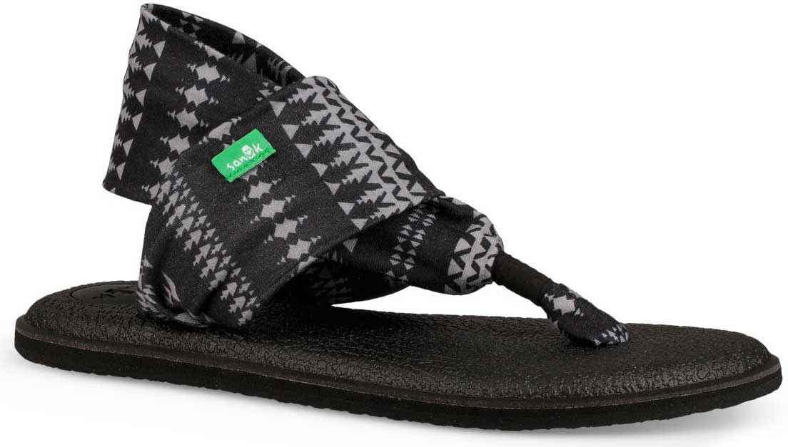 Sanuk Ladies' Yoga Sling 2 Prints Sandal - A black and white houndstooth patterned sandal with a green logo on the strap.