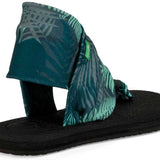 Sanuk Ladies' Yoga Sling 2 Prints Sandal - A green and grey tropical print sandal with a thick strap around the ankle.