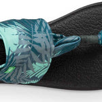 Sanuk Ladies' Yoga Sling 2 Prints Sandal - A sandal with a strap that wraps around the big toe and has a tropical print on it.