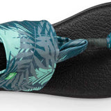 Sanuk Ladies' Yoga Sling 2 Prints Sandal - A sandal with a strap that wraps around the big toe and has a tropical print on it.