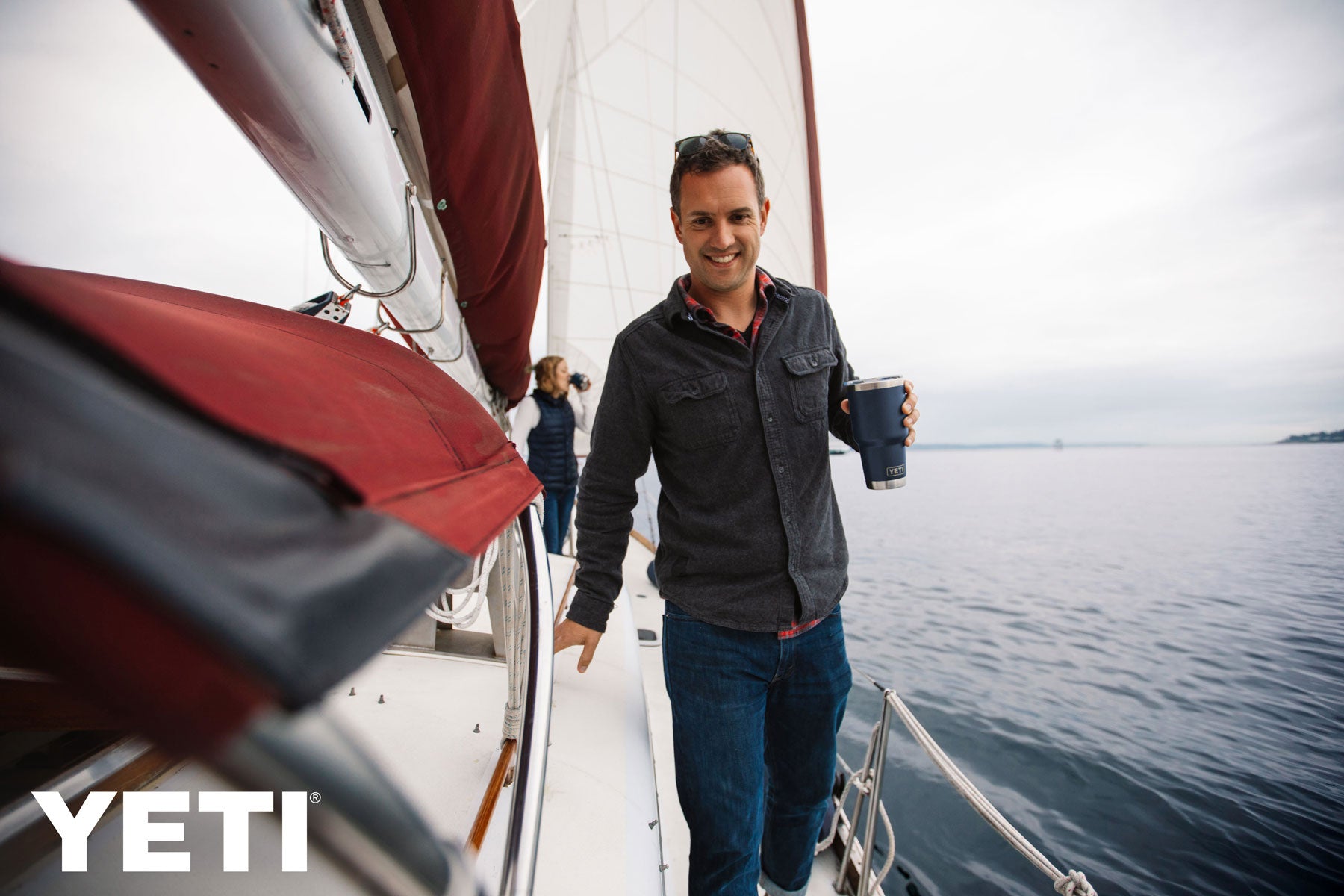 Yeti Rambler 30 oz. Tumbler with Magslider Lid - A stainless steel tumbler with a silver lid and a sliding closure mechanism.