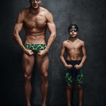 Speedo Jr. Vanquisher 2.0 Swim Goggle - A pair of black swim goggles with dark gray lenses and a white logo on the strap.