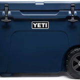 Yeti Tundra Haul Wheeled Cooler - A large, dark blue cooler with a handle and wheels on the bottom.