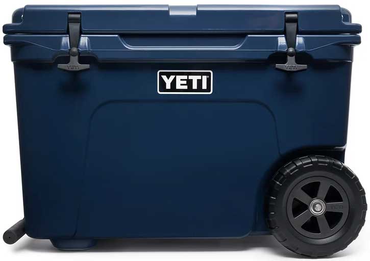 Yeti Tundra Haul Wheeled Cooler - A large, dark blue cooler with a handle and wheels on the bottom.