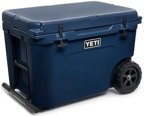 Yeti Tundra Haul Wheeled Cooler - Large, dark blue cooler with wheels and handle on top.