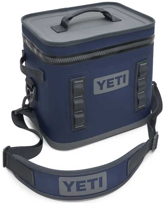 Yeti Hopper Flip 12 Personal Cooler - A navy blue cooler with a zippered top and two handles, featuring the word "YETI" in gray on one side.