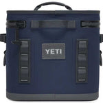 Yeti Hopper Flip 12 Personal Cooler - A navy blue cooler with a handle on top and two zippered compartments, one on each side.