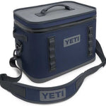 Yeti Hopper Flip 18 Personal Cooler - A navy blue cooler with a gray lid and handle, featuring a zippered top and two side handles.