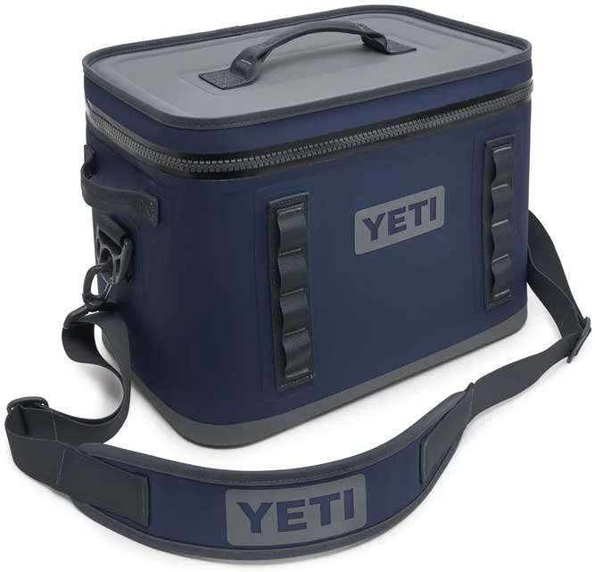 Yeti Hopper Flip 18 Personal Cooler - A navy blue cooler with a gray lid and handle, featuring a zippered top and two side handles.