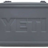 Yeti Hopper Flip 18 Personal Cooler - A gray cooler with a handle on top and two latches, featuring the word "YETI" embossed in the center.