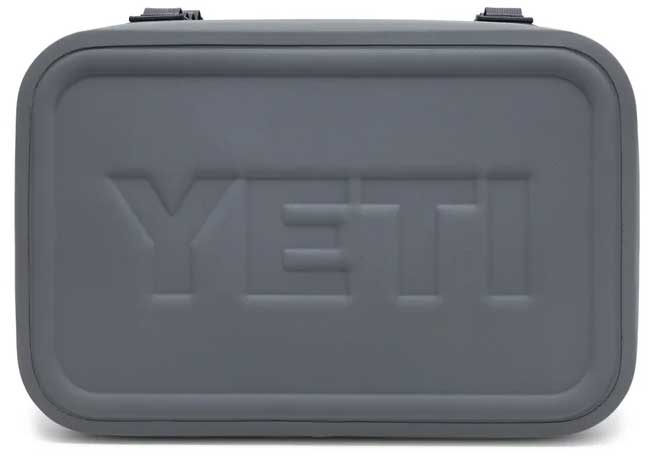 Yeti Hopper Flip 18 Personal Cooler - A gray cooler with a handle on top and two latches, featuring the word "YETI" embossed in the center.